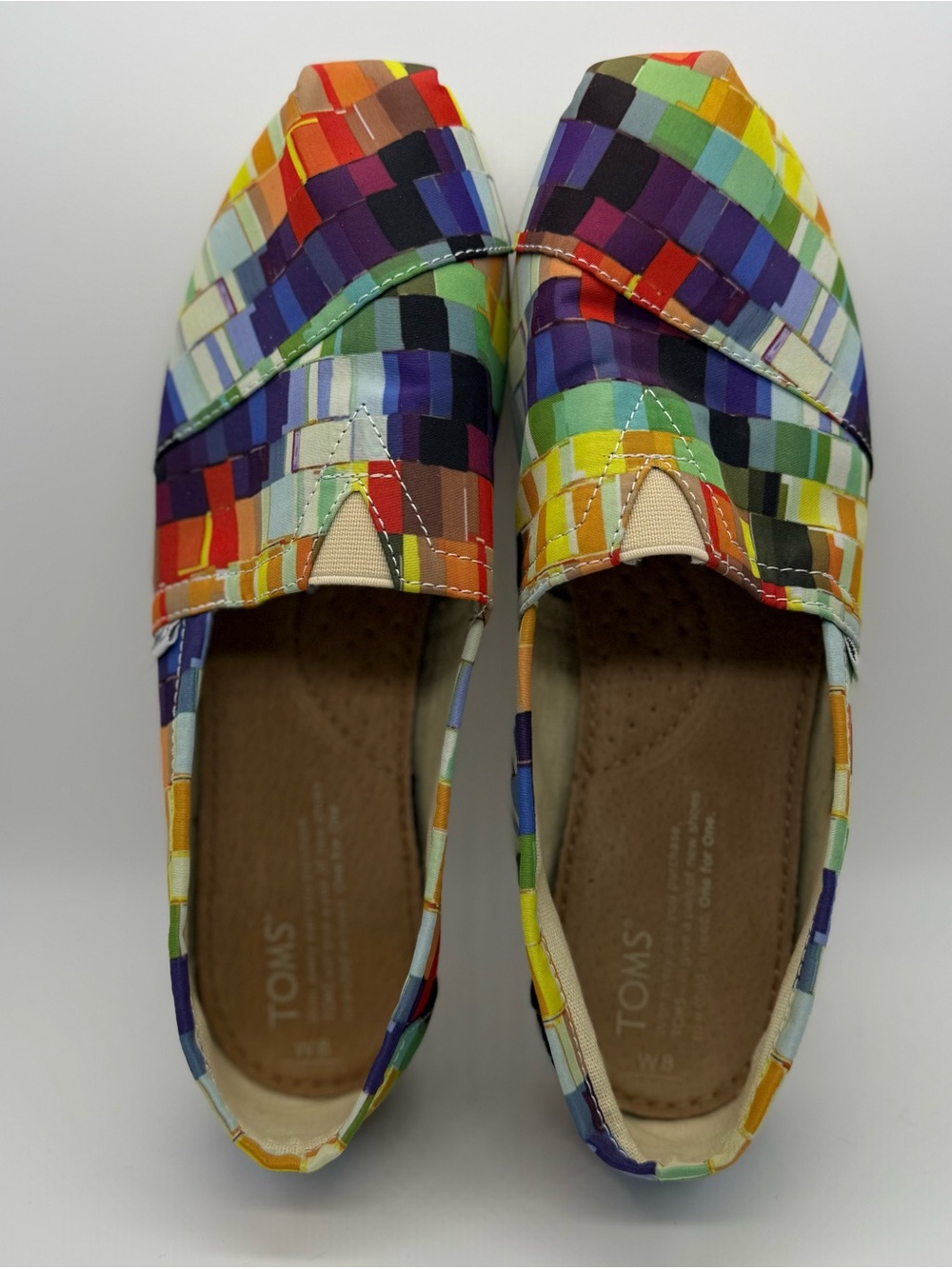 TOMS women’s Classic Slip-On Shoes in Multi Rainbow. Size 8. Worn once!
